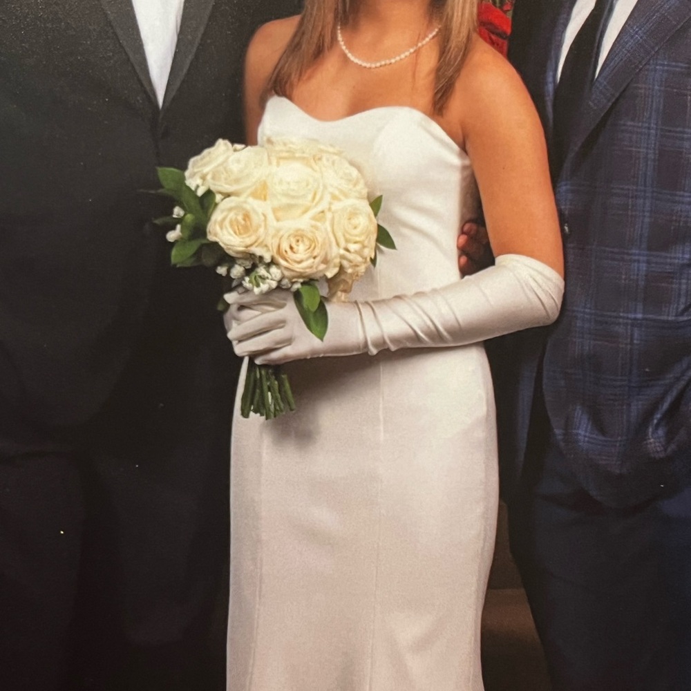 Dress from Anthropology’s Wedding collection. Brand is W• too by Waters. Size 0.